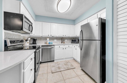 Holiday Isle Condo | Dolphin Point 106C - Harbor Views & Boat Slip