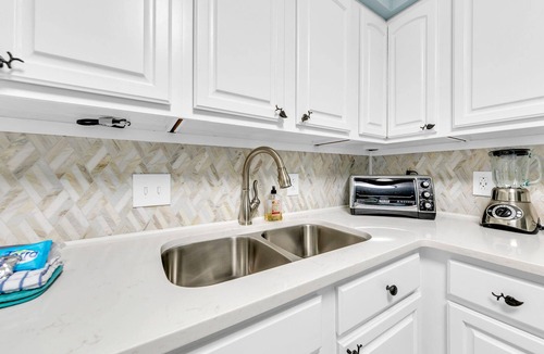 Holiday Isle Condo | Dolphin Point 106C - Harbor Views & Boat Slip