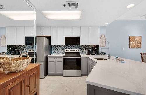 Destin Condo | Elegant 2BR Gulf front condo sleeps 4 balcony, chefs' kitchen and view.