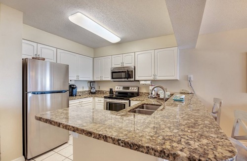 Destin Condo | Pelican Beach 0414 (2-Bedroom Condo) with Pool - Handicap accessible by Pelican Beach Management