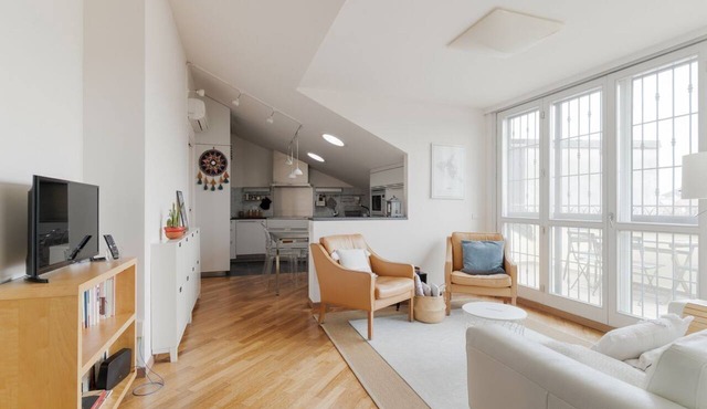 GuestHost - Elegant and modern 90 square meters apartment, perfect for four people, located on the fifth floor of a building with elevator (NOT suitable for disabled people).The property is located in the Navigli area (limited traffic zone), one of the c